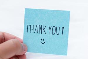 Business gratitude note personal touch thank you calm setting handheld perspective expressing appreciation for collaborations photo