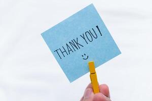 Thank you note action business setting visual content minimalist background close-up view gratitude concept for business impact photo