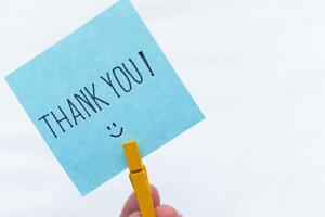 Thank you note for business milestone celebration office space digital content professional environment close-up gratitude concept photo
