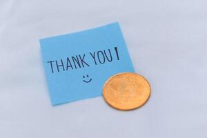 Gratitude in business thank you note with cryptocurrency office desk visual content minimalistic environment close-up view for impact photo