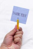 Business appreciation gesture office desk thank you note indoor close-up gratitude concept for business growth photo