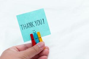 Thank you note for business success office setting graphic design minimalist background close-up view gratitude concept photo