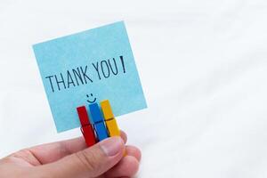Thank you note for business acknowledgment office setting visual content minimalist environment close-up view gratitude concept photo