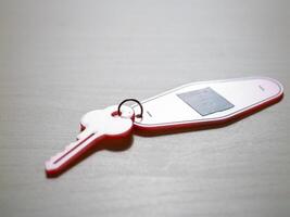 Security concept key on table in a minimalist home office environment photo