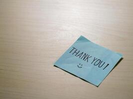Minimalist style thank you note on desk an inspiring gratitude message photo