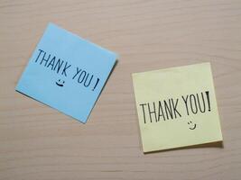 Thank you notes gesture home office visual communication indoor close-up gratitude concept photo