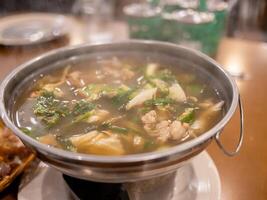 Experience cozy comfort savory hot pot dining in a culinary delight setting photo