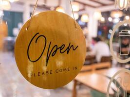 Welcoming evening scene at urban with open sign in cozy atmosphere photo