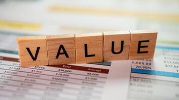 Business value assessment financial reports data analysis office setting close-up financial insights photo