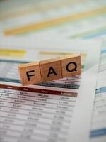Business faq insights navigating financial documents office environment informational guide photo