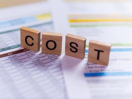 Business cost analysis using financial reports office environment document photo