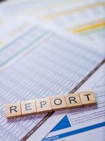 Data insights from business report analysis a close-up office workspace documents photo