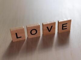 Affection displayed love wooden blocks table lifestyle indoor close-up emotion photo