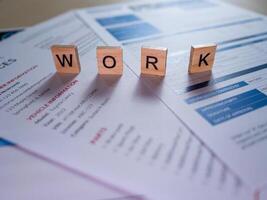 Indoor close-up of job applications and work documents in a professional office setting photo