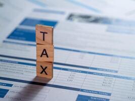 Tax preparation process home office financial documents indoor close-up view fiscal responsibility photo
