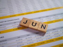 June financial overview business report office setting analytical perspective monthly insights photo