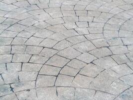 Paved stone patterns urban environment texture close-up view artistic concept photo