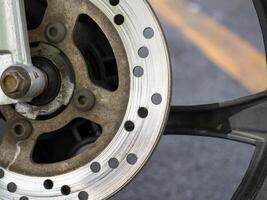 Maintenance action motorcycle brake system urban garage mechanical image close-up view photo