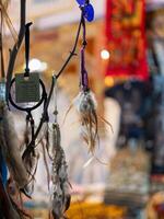 Dreamcatcher display market close-up cultural setting artistic perspective bohemian vibes photo