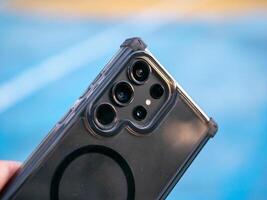 Smartphone action urban environment mobile device close-up viewpoint technology concept photo