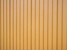 Minimalist design textured yellow wall panels in modern urban architecture photo
