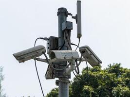 Surveillance technology installing outdoor monitoring systems in urban areas photo