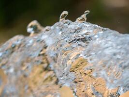 Dynamic water splashing action natural setting close-up nature fluid motion concept photo