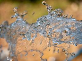 Dynamic water splashing action nature setting close-up vibrant environment captivating viewpoint photo
