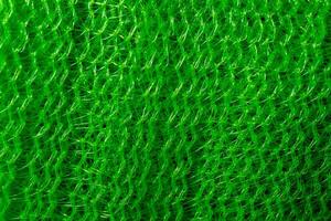 Bright Green Mesh Pattern Abstract Closeup Plastic Texture Background photo