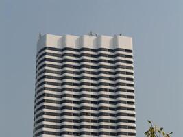 Innovative urban skyscraper construction elevated viewpoint and clear sky architecture photo
