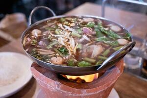 Cozy hot pot delights an intimate culinary experience a warm inviting atmosphere photo