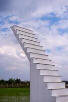 Abstract staircase installation open field artistic outdoor serenity unique perspective photo