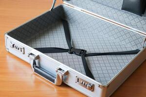 Top-down view of an open briefcase a calm office setting business concept capture photo