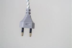 Exploring energy loss minimalist view of power plug disconnection in indoor electrical settings photo