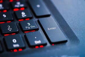 Key features of a modern laptop keyboard close-up technology office macro design photo