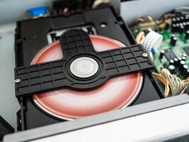 Internal computer cd drive action technology hardware close-up mechanical digital media photo