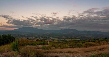 A view of the mountains and clouds at sunset video