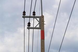 Power lines against cloudy sky infrastructure urban environment elevated viewpoint photo