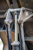 Close-up view of heavy machinery at construction site engineering and mechanical components photo