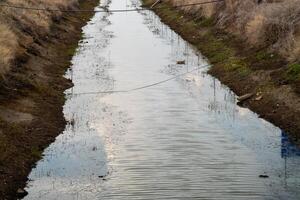Calm reflection of waterway urban environment nature scene serene landscape aerial view photo