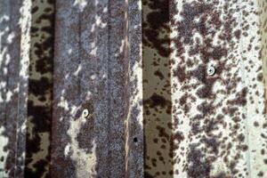 Rusty metal textures urban environment close-up industrial setting abstract concept photo