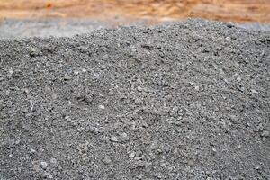 Outdoor construction site image gravel material usage from ground-level perspective photo