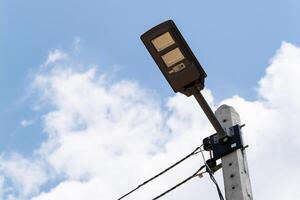 Modern street light installation urban area infrastructure daytime close-up innovation photo