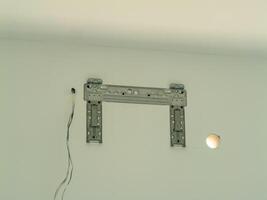 Installing a tv mount drywall home setup visual guide indoor close-up diy techniques photo
