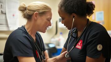 Two healthcare professionals assisting a patient in a medical setting during a routine examination photo