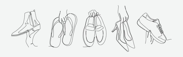 Set of drawing of hands holding boots, flip flops, loafers, high heels, and sneakers in continuous one line drawing style. Clothing, headwear concept. Editable line illustration vector