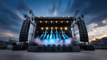 Illuminated concert stage awaits performers ready for an outdoor festival music show performance photo