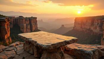 Stone table overlooking sunset canyon landscape photo
