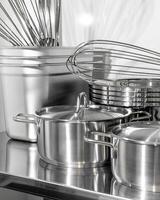 Shimmering against the stainless steel sanctuary, culinary tools whisper tales of Pancake Day precision and Lunar New Year feasts photo
