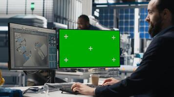 Solar panel specialist uses green screen and oversees manufacturing strategy, combining industrial insight with clean energy goals for sustainable solutions and development. Camera B. photo
